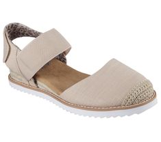 a women's sandal with an open toe and two straps on the side