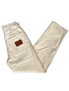 "90s BOSS brand jeans. deadstock. NWT. baggy fit. natural / cream. double button closure. side pockets. back pockets. embroidered logo on front. sewn leather brand patch on back. 14.5\" waist laid flat. 13.5\" rise. 32\" inseam. 8\" leg opening, laid flat. in excellent, unworn condition. made in USA. legit. legitvintage.etsy.com legitvintage on instagram" Cream Tapered Leg Jeans With Pockets, Cream Relaxed Fit Jeans With Pockets, Vintage Straight Leg Beige Jeans, Vintage Beige Straight Leg Jeans, Ig Design, Boss Brand, Design Jeans, Mens 90s, Cream Jeans