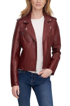 A faux leather jacket that is lightweight and perfect for any season. Fit: this style fits true to size. Notch collar. Long sleeves. Asymmetric zip closure. Slash pockets. Button detailing throughout. Epaulets. Faux leather construction. Approx. 22" length (size S). Imported Winter Biker Jacket With Side Zipper, Fall Biker Leather Jacket With Zipper Closure, Fall Biker Leather Jacket With Zipper, Fitted Winter Biker Jacket With Metal Zipper, Fitted Leather Jacket With Metal Zipper For Winter, Fitted Biker Jacket With Metal Zipper For Winter, Asymmetrical Zip Leather Jacket With Ykk Zipper For Fall, Edgy Leather Jacket With Ykk Zipper For Fall, Fitted Leather Jacket With Side Zipper For Fall