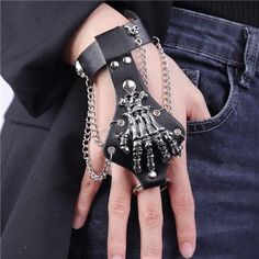 -Material: Metal+Pu Leather -Color : Silver+ Black -Size: As Picture Shown -Gothic Skull Bracelet For Halloween Cos Party, Wearing It You Will Win Tons Of Compliments -100% Satisfaction And Money Back Guarantee. If There Are Any Problems With The Purchase, Please Feel Free To Contact Us, We Will Help To Fix The Problem Or Make The Full Refund. Alternative Style Metal Bracelets For Party, Alternative Metal Bracelets For Party, Black Rocker Style Jewelry For Festival, Black Rocker Jewelry For Festival, Black Rock Style Jewelry For Halloween, Rocker Style Metal Jewelry For Festival, Edgy Black Bracelet For Halloween, Rock Style Metal Jewelry For Alternative Fashion, Rock Style Jewelry For Halloween And Alternative Fashion