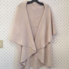 Bought This Piece Last Week In A Mystic Ct Boutique For An Outdoor Wedding... Never Worn ...So Have Tags Detached And Instructions On How To Wear This Versatile Piece. Beautiful Sweater...But I Have Too Many Of Them! Selling For 1/2 Off Purchase Price Firm! Fitted Open Front Vest For Fall, Fitted Beige Outerwear For Layering, Beige V-neck Outerwear For Layering, Fitted Beige Vest For Layering, Chic V-neck Outerwear One Size, Fitted Neutral Outerwear For Layering, Sleeveless Beige Outerwear For Layering, Beige Fitted Open Front Outerwear, Beige Vest For Layering