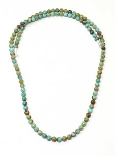 "35"" turquoise necklace featuring 8mm round beads finished with silver cones and closure." Luxury Southwestern Hand-strung Beaded Necklaces, Cheap Hand-strung Southwestern Beaded Necklaces, Luxury Southwestern Single Strand Beaded Necklaces, Luxury Southwestern Single Strand Beaded Necklace, Round Bead Necklace, Bead Necklace, Round Beads, Turquoise Necklace, Beaded Necklace