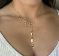 ITEM DETAILS: Handmade Dainty 18k Plated Gold chain with letters. You can personalize it with your initials, your name, kids name or any other word. to wear it for everyday! MATERIALS: ~Chain :18K Plated Gold ~Letter: 18K gold plated SIZE: ~Chain width: 2x1.5mm ~Chain length: 15"- 16" and 18" plus 2" extension ~Letters Height: 12 mm Wide: depending on the letter you chose but is 10mm Approx SHIPPING & DELIVERY: (Estimated) ~ Domestic (U.S.) Standard: 2 - 5 business days ~Domestic (U.S.) Priority: 1 - 3 days FOLLOW US: https://instagram.com/lourdes_jewelry_ https://https://www.facebook.com/LourdesDJewelry Thank you so much for visiting and hope you enjoy shopping with us Customized Adjustable Initial Pendant Necklace, Initial Pendant Name Necklace With Adjustable Chain, Personalized Initial Pendant Name Necklace With Adjustable Chain, Adjustable Initial Pendant Name Necklace For Anniversary, Adjustable Personalized Initial Pendant Name Necklace, Personalized Gold Lariat Jewelry, Adjustable Personalized Initial Pendant Necklace, Personalized Adjustable Initial Pendant Name Necklace, Adjustable Initial Pendant Name Necklace