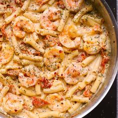 a pan filled with pasta covered in sauce