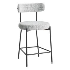 an upholstered stool with black legs and a white fabric seat cover on the back