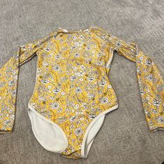 Yellow Flower, One Piece, Longsleeve, Zip Up Kids Swimsuit, Never Worn Fitted Long Sleeve Bodysuit With Floral Print, Spring Floral Print Long Sleeve Bodysuit, Spring Long Sleeve Floral Print Bodysuit, Yellow Long Sleeve Swimwear For Spring, Long Sleeve Floral Print Stretch Swimwear, Spring Stretch Printed Bodysuit, Spring Printed Stretch Bodysuit, Long Sleeve Floral Print Swimwear For Spring, Summer Long Sleeve Printed Bodysuit