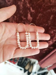 ∙These pearl hoop earrings are super femme and perfect for dressing up a simple outfit! Would also be wonderful for a bride with a bit of vintage flair. ∙Unique shape is sure to catch you some compliments. ∙Nice and lightweight on the ear! ∙Top quality materials are excellent for sensitive ears/skin. ∙These measure ~2.25 inches long. ~M A T E R I A L S ~ Choose from- * 925 Sterling silver *14k Gold fill *14k Rose gold fill **What is 14k Gold-fill?** Gold fill does not tarnish or wear off and con Pearl Chain Hoop Earrings For Wedding, Elegant Hoop Chandelier Earrings, Elegant Hoop Earrings With Pearl Chain For Wedding, Elegant Pearl Chain Hoop Earrings For Wedding, White Pearl Embellished Hoop Earrings For Wedding, Chic Pearl Embellished Earrings For Wedding, Chic Wedding Hoop Earrings, Small Pearl Hoop Earrings For Wedding, Small Hoop Pearl Chain Wedding Jewelry