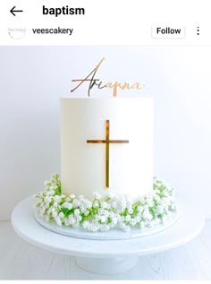 a white cake with a cross on top