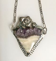 Vintage Sterling Silver Necklace With Large Stone, Artisan Sterling Silver Necklace With Gemstone Accents, Unique One Of A Kind Purple Necklace, Hand Forged Amethyst Pendant Necklace, Silver Necklaces With Gemstone Accents, Amethyst Necklace With Large Pendant For Healing, Unique Hand Forged Purple Necklaces, Unique Silver Necklaces With Gemstone Accents, Unique Purple Necklace