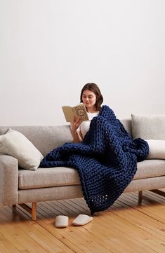 A chunky, weighted knit helps you sleep better and feel calmer under a blanket made with a touch of stretch from soft organic cotton. 40" x 72" (15 lbs.); 45" x 72" (20 lbs.); 48" x 72" (25 lbs.) 10% of your body weight recommended for optimal comfort for single-sized blankets 95% organic cotton, 5% spandex Machine wash, tumble dry Imported This product meets Nordstrom Sustainably Sourced Materials criteria: contains at least 50% sustainably sourced materials Navy Blue Weighted Blanket, Knit Blanket Target, Blue Blanket Knit, Azul Blanket, Night Blanket, Blanket Photography, Cellular Blanket, Thermal Blanket, Heavy Blanket