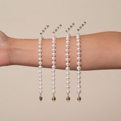 This elegant yet simple bracelet is composed of perfectly round Japanese akoya pearls. The pearls measure 7.5-8.0 mm, which is a very popular and easily wearable size. The pearls are individually knotted on twin silk so they never rub or scratch, and the bracelet is finished with a solid gold clasp with a safety catch. Your pearls will always be secure. Akoya pearls are known for their perfect round shape and unmistakable luster unique to pearls grown in the cold coastal waters of Japan. The fin Single Strand Akoya Pearl Bracelet In Pearl White, Luxury Akoya Pearl Jewelry In Pearl White, Classic Hallmarked Akoya Pearl Jewelry, Timeless Single-strand Akoya Pearl Necklace, White Akoya Pearl Necklace - Fine Jewelry, Jewelry Appraisal, Simple Bracelets, Pearl Types, Elegant Bracelet