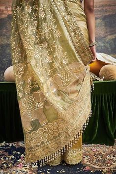 Olive green saree featuring gota patti embroidered floral vine motifs, thread embroidered elephant patterns on pallu, embellished by mirrorwork tassels and ghunghroo. Comes with mirrorwork embellished padded blouse. - Aza Fashions Intricate Mirror, Gotta Patti Work, Gota Embroidery, Dabka Work, Mirror Work Saree, Gota Patti Work, Gotta Patti, Set Saree, Green Saree