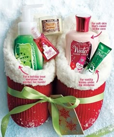 an advertisement for bath and body products in the snow with christmas decorations on it's side