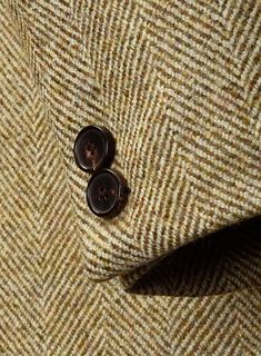 Aim for a lavish take on a casual style with our Highlander Heavy Beige Herringbone Tweed Jacket. Most significantly, crafted from a pure wool material expresses a thick, decently rugged and gorgeously soft texture with a distinctive herringbone weave over a brown hue. Additionally, the cloth exudes an enormously cozy vibe, which makes this jacket an excellent investment for the winter. Primarily, the precise tailoring jacket frames the contour and ensures you look sharp for a charming profile w Timeless Long Sleeve Tweed Jacket, Classic Wool Tweed Jacket With Herringbone Pattern, Classic Tweed Sport Coat With Herringbone Pattern, Tailored Tweed Outerwear With Herringbone Pattern, Tailored Wool Sport Coat With Herringbone Pattern, Classic Winter Tweed Jacket, Brown Wool Herringbone Outerwear, Brown Wool Outerwear With Herringbone Pattern, Timeless Wool Blazer With Herringbone Pattern