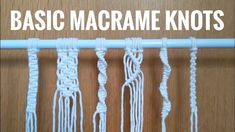 some white yarn is hanging on a wooden wall with the words basic macrame knots