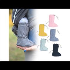 several pairs of boots are being held by someone's hand and the image shows them in different colors