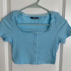 Shein Baby Blue Crop Top With Lace Trim And Button Trim Size Small Cute Blue Button-up Top, Fitted Light Blue Tops With Button Closure, Light Blue Fitted Top With Buttons, Fitted Light Blue Tops With Buttons, Fitted Light Blue Top With Buttons, Cute Blue Tops With Button Closure, Tops Shein, Top With Lace Trim, Blue Crop Top