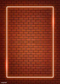 a brick wall with a neon frame in the shape of a rectangle on it