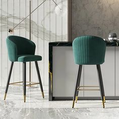 two green chairs sitting next to each other on top of a white tiled floor in front of a counter