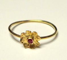 Bright Spot Ring - This beautiful delicate 18K gold ring inlaid Ruby. The Ring is part of My Hidden Seed Collection. The ring size is 6mm. The Ring will be packed in a gift box and is ready to give as a gift. Free Shipping! Your item will be shipped via registered air mail with tracking number. Please contact me with any questions or requests. My Sterling Silver Hidden Seeds Collection at http://www.etsy.com/il-en/shop/NogaJewelry# 22k Yellow Gold Ruby Ring For Wedding, 22k Yellow Gold Ruby Wedding Ring, Yellow Gold 22k Ruby Wedding Ring, Elegant 22k Gold Rings For Gift, Gold Dainty Ruby Ring For Formal Occasions, 22k Gold Ruby Ring As A Gift, Dainty Gold Ruby Ring For Formal Occasions, 22k Yellow Gold Ruby Ring, 22k Yellow Gold Ruby Ring For Anniversary