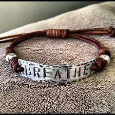 BREATHE ID Bracelet silver leather Hand Stamped by DESIGNbyANCE Personalized Adjustable Brown Jewelry, Handmade Adjustable Meaningful Bracelets, Inspirational Adjustable Hand Stamped Jewelry, Adjustable Spiritual Leather Bracelet For Friendship, Handmade Adjustable Spiritual Leather Bracelet, Adjustable Stamped Leather Bohemian Bracelet, Silver Leather Bracelet With Hand Stamped Details For Everyday, Adjustable Silver Leather Bracelet For Gift, Adjustable Silver Leather Bracelet Gift