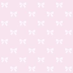 a pink background with white bows on it