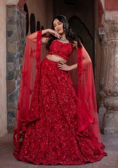 Item: Lehenga Set ( Lehenga Skirt, Blouse and Dupatta) Illuminate your wedding day with our Crimson Bridal Lehenga, a radiant blend of tradition and contemporary elegance. Handcrafted with love and care by our artisans, this ensemble is designed to make you feel like the most beautiful bride in the world. Customize your lehenga and let your inner radiance shine as you create timeless memories on your special day. The stunning bridal attire made on premium quality net fabric has cutdana and pearl embellishments with tone to tone embroidery done making this a designer lehenga for your big day. Our bespoke lehengas are designed with a can-can lining beneath the skirt to ensure a voluminous silhouette that enhances your twirls and captures stunning photographs. At Vivah by Shobitam, our utmost Traditional Drape Wedding Sets With Dori Work, Traditional Drape Sets For Wedding And Navratri, Wedding Sets In Traditional Drape For Navratri, Wedding Sets With Traditional Drape For Navratri, Lengha Blouse Designs, Lehenga Choli Designs, Special Occasion Gowns, Red Mermaid, Bridal Attire