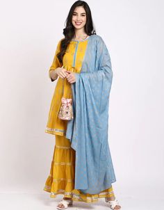 Radiate sunshine with the Yellow Rayon Sharara Suit 🌞👗 A perfect blend of vibrancy and elegance. Elevate your look with this stunning and versatile ensemble! 💃✨ #YellowShararaSuit #RayonCharm #VibrantElegance #VersatileStyle Yellow Embroidered Cotton Palazzo Set, Yellow Cotton Palazzo Set With Dupatta, Unstitched Yellow Cotton Sharara, Festive Yellow Cotton Sharara, Cotton Palazzo Set With Gota Work And Long Sleeves, Cotton Long Sleeve Palazzo Set With Gota Work, Yellow Cotton Sharara With Resham Embroidery, Yellow Embroidered Straight Kurta Set, Long Sleeve Cotton Palazzo Set With Gota Work