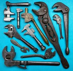 an assortment of tools are displayed on a blue background