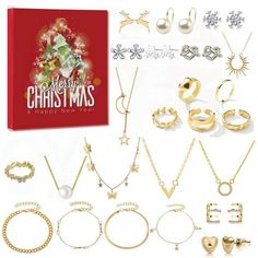 christmas jewelry set with earrings, rings and bracelets in gold color box on white background