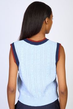 Light blue cable knit varsity trim sweater vest Blue Sleeveless Sweater Vest For Winter, Blue Knit Sweater Vest For Fall, Blue Knit Vest For Fall, Blue Vest Sweater For Fall, Blue Vest-style Sweater For Fall, Blue Knitted Sleeveless Vest, Blue Knitted Sleeveless Sweater Vest, Blue Sleeveless Knit Sweater, Blue Sleeveless Casual Sweater