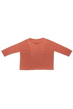 a small child's top with long sleeves and an open neckline, in orange