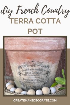 a pot with some eggs in it and the words diy french country terra cota pot