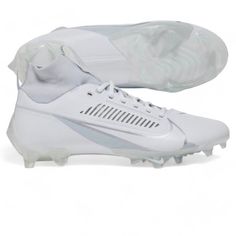 a pair of white soccer shoes on a white background