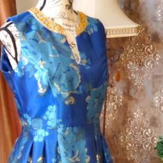 Beautiful, Floral, Metallic Dress. Outstanding Quality Fabric With Stunning Details. Never Worn. Blue A-line Sleeveless Dress For Wedding, Elegant Blue Sleeveless Dress For Wedding, Blue Silk Sleeveless Dress, Elegant Blue A-line Sleeveless Dress, Badgley Mischka Dress, Metallic Dress, Size 8 Dress, Badgley Mischka, Pleated Dress