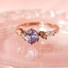 a close up of a ring on a glass plate