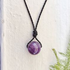 Subtle And Simple, Adjustable Necklace Ft. A Genuine Amethyst (10mm Or 1/2” Wide) Gemstone Pendant In A Black Waxed Polyester Thread. Finished W/ A Sliding Knot. : Adjustable Knot! (Opens Up To 26") #: Handmade Necklace Healing Crystals Jewelry Metaphysical Stones Gemstones Rocks Reiki Energy Meditation Yoga Protection Earthcore Witchy Wicca Magick Occult Oddities Tarot Slytherin Hobbit Elf Handmade Bracelet Boho Romantic Goth Fairy Grunge Jewelry Gypsy Stackable Bracelet Dainty Minimalist 90s Y Purple Crystal Healing Necklace, Purple Round Crystal Healing Necklace, Adjustable Lavender Amethyst Necklace, Adjustable Spiritual Purple Necklaces, Adjustable Purple Necklace For Gifts, Adjustable Purple Necklace For Gift, Adjustable Amethyst Crystal Necklace, Chakras Gemstones, Fairy Grunge Jewelry