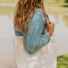 A classic leather tote is a wardrobe staple every girl needs in their life. And these beauties are here in our fun new colours to add a pop of color to your wardrobe! Its buttery soft leather and minimalistic yet functional design makes this a bag that will fit seamlessly into your life. Whether it’s tagging along for a weekend trip to the farmer’s market, holding all your work or school necessities, or traveling with you around the world, you’ll find this beautiful genuine leather tote the bag Simple Everyday Bag, Spring Soft Leather Shoulder Bag For Daily Use, Everyday Tote Shoulder Bag For Spring, Everyday Spring Tote Shoulder Bag, Spring Canvas Shoulder Bag, Everyday Spring Shoulder Bag, Chic Everyday Shoulder Bag With Smooth Grain, Chic Soft Leather Shoulder Bag For Spring, Casual Soft Leather Shoulder Bag For Spring