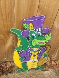 a green and yellow alligator wearing a purple top hat, holding a skateboard in its paws