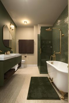 a bath room with a tub a sink and a mirror