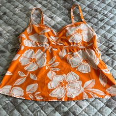 New Without Tags. Orange And White Flowered Tankini By Land’s End. Size Medium! Orange Floral Print Beach Top, Lightweight Spring Beach Top, Summer Printed Orange Tops, Lined Tops For Beach In Spring, Orange Floral Print Tops For Beach Season, Summer Vacation Lined Top, Lined Summer Top For Vacation, Spring Beach Lined Tops, Lined Summer Vacation Top