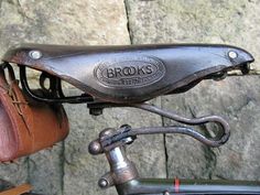 a close up of a bike handlebar and saddle