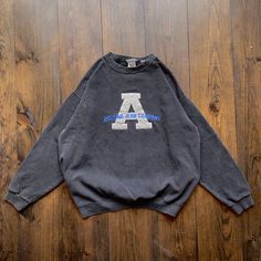 Vintage 1990s Arizona Jeans Embroidered Crewneck Sweatshirt / made in USA / tag size Large (see measurements) Pit to Pit:   24" Top of Shoulder to Bottom Hem:   26" Collar to Bottom of Sleeve:   28" Please check the measurements before purchasing ---------------------------------- 🛒 Why Vintage? Vintage clothing is an environmentally sustainable way to shop for cool, unique, and rare clothing. Vintage clothing is typically higher quality than modern fast fashion manufacturing. Material from the 90s Style Crew Neck Sweatshirt With Embroidered Graphics, Vintage College Sweatshirt With Embroidered Text, Vintage Letter Embroidery Sweatshirt For Streetwear, Vintage Embroidered Sweatshirt For Streetwear, Vintage Long Sleeve Sweatshirt With Letter Embroidery, 90s Embroidered Long Sleeve Sweatshirt, 90s Embroidered Top For Streetwear, Vintage Embroidered Graphic Top For College, Vintage Embroidered College Top