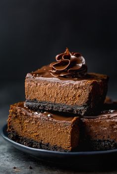 three pieces of chocolate cake on a plate