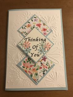 a handmade card with the words thinking of you on it