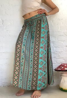 This is maxi long bohemian skirt with floral patterns beautiful and light summer outfit, very easy to wear perfect casual everyday skirt in bohemian syle size S/M 15 -16 inch elastic waist 39 inch length Bohemian Maxi Bottoms With Floral Print, Bohemian Maxi Length Bottoms With Floral Print, Bohemian Maxi Length Floral Print Bottoms, Bohemian Wide Leg Maxi Dress For Spring, Bohemian Flowy Maxi Skirt With Floral Print, Bohemian Wide Leg Maxi Dress For Summer, Bohemian Beach Maxi Dress With Lined Skirt, Bohemian Wide Cut Summer Maxi Dress, Bohemian Maxi Dress With Lined Skirt For The Beach