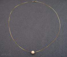 "New and exclusive to Benati. A very elegant round bead necklace, floating gracefully on a dainty solid 14k gold chain. Crafted to perfection in 14k solid gold. The pendant is hanged on a elegant, delicate and dainty gold 'box' approx. 0.6mm chain. if you wish for a thicker chain approx. 0.8mm chain, you can choose so at the checkout process. The pictures are of the approx. 0.6mm gold chain. You or your friend will look super fine with this new exclusive design - by Benati. The size of the round Round Bead Necklace, Necklace Bead, Single Bead, Gold Bead Necklace, Solid Gold Chains, Gold Box, Gold Beads, Bead Necklace, Round Beads