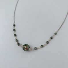 "Looking for something unique and different? This beautiful necklace displays a nice and small Tahitian Pearl paired with small and dainty tahitian keshis pearls . ✨This Listing is for Sterling Silver. For the Gold-filled necklace is click on the following link: Length : 17-18\" if you need a different size please specify at checkout . There is an extender on the back to make it more versatile and can be adjusted slightly about 1\" . Description ✨Tahitian pearls: Size : 8-9mm small and dainty si Handmade Pearl Necklace With Briolette Shape, Gift Jewelry With Polished Baroque Pearl Beads, High Luster Tahitian Pearl Necklace, Silver Single Strand Pearl Pendant Necklace, Gift Necklaces With High Luster Mother Of Pearl, Tahitian Pearl Briolette Necklace For Gifts, Tahitian Pearl Drop Necklace As Gift, Tahitian Pearl Drop Necklace For Gift, Unique Pearl Necklace Chain As Gift