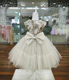 Your girl will look special in this cute dress! Gold and cream colours create an unforgettable elegant look for your princess! Gold Princess Pageant Dress For Dress-up, Elegant Cream Tutu Dress With Ruffles, Gold Ruffled Tutu Dress For Wedding, Gold Princess Dress With Ruffles, Elegant Gold Princess Dress For Party, Elegant Glitter Tulle Pageant Dress, Elegant Gold Princess Dress With Ruffles, Gold Tulle Dress With Ruffles, Champagne Tulle Dress With Sequins