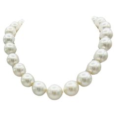 Gorgeous white round South Sea pearls (total of 25) with a ball clasp with 1.75 ct. good quality white diamond pave. Handmade in 18k white gold clasp and hand strung beautifully. Length 15.5" but it can be adjusted if necessary. White Diamond Necklace, White Gold Necklaces, South Seas, South Sea Pearls, Sea Pearls, Good Quality, Pave Diamonds, White Diamond, Pearl White